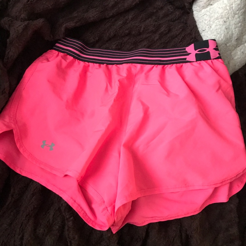 Hot pink UA Under Armour running shorts